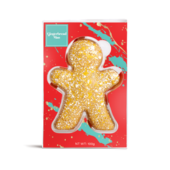 Splatter painted gingerbread man cookie in a red box with 'Gingerbread Man' label.
