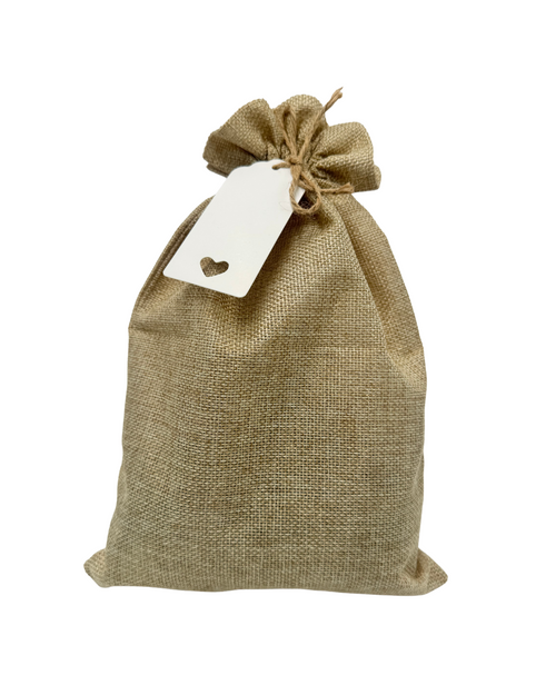 Jute bag with a white tag on a white background