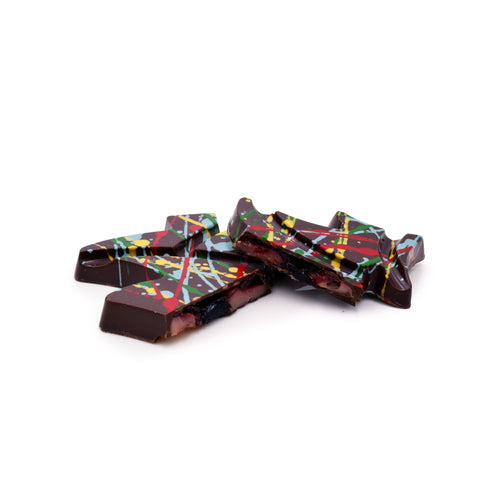 Tree shaped chocolate bar broken in half showing the inside.