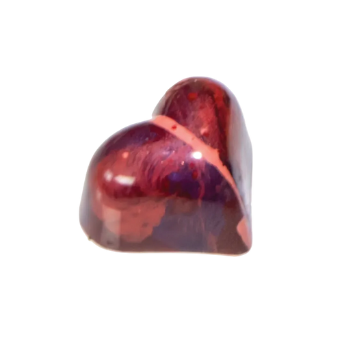 Heart-shaped bonbon with red and purple colors on a white background